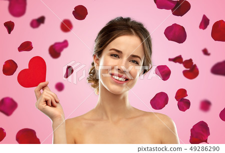 beautiful smiling woman holding red heart beautiful smiling woman holding red heart 49286290