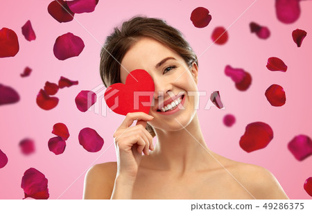beautiful smiling woman holding red heart beautiful smiling woman holding red heart 49286375