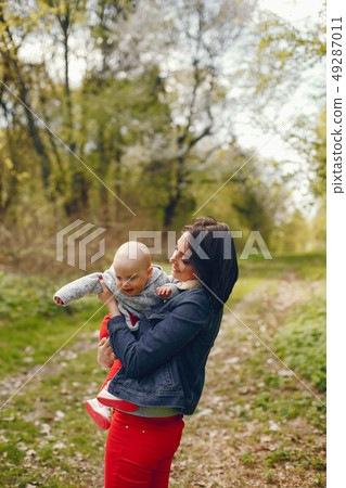 Mother with son in a spring park 49287011