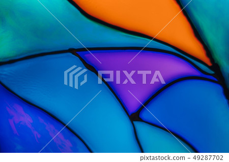 Colorful stained glass background. Colorful stained glass background. 49287702