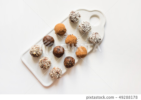 Homemade energy balls with cacao and nuts  49288178
