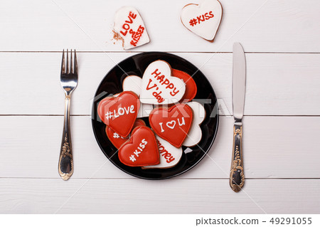 Cookies heart lie on a plate. Valentine's Day 49291055