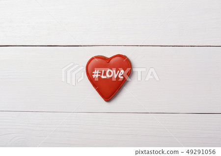 Heart with tag on a table. Valentine's Day kiss 49291056