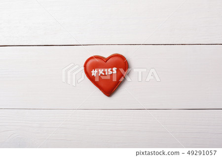 Heart with tag on a table. Valentine's Day kiss 49291057