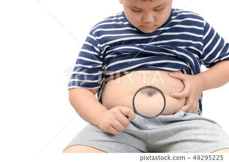 Obese boy overweight  holding magnifying glass 49295225