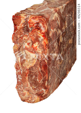Frozen block of beef on a white background. 49298314