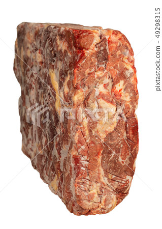 Frozen block of beef on a white background. 49298315