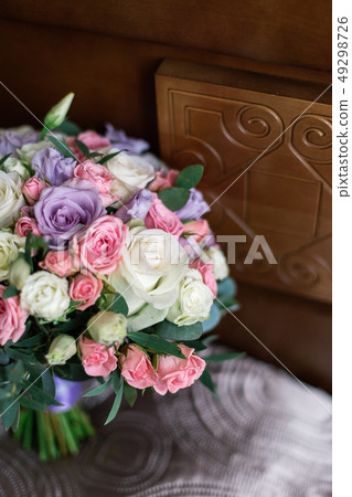 Very beautiful fresh wedding bouquet of flowers. Very beautiful fresh wedding bouquet of flowers. 49298726
