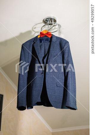 stylish black suit with white shirt and bow tie on stylish black suit with white shirt and bow tie on 49299057