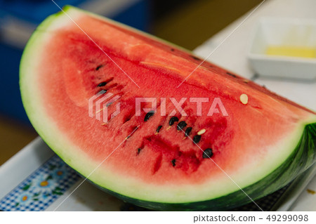 Sliced red fresh watermelon on the table. 49299098