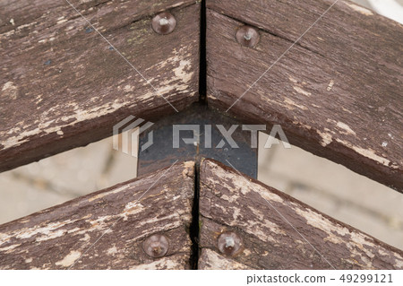 Brown wood strips from park bench. Wooden boards Brown wood strips from park bench. Wooden boards 49299121