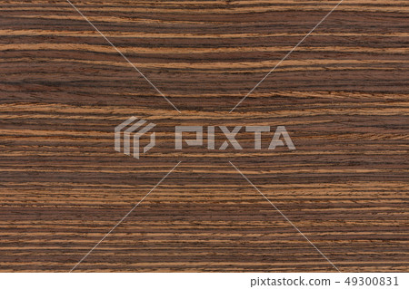 Texture of dark ebony veneer. Natural ebony veneer background. Texture of dark ebony veneer. Natural ebony veneer background. 49300831