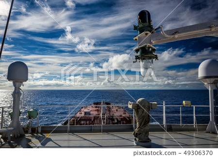Tanker proceeding by ocean. - on compass deck Tanker proceeding by ocean. - on compass deck 49306370
