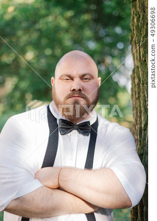 fat guy with bow tie