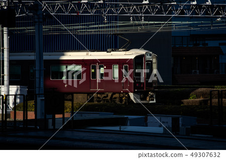 Hankyu Electric Railway Series 9300 receiving the setting sun Hankyu Electric Railway Series 9300 receiving the setting sun 49307632