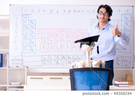 Young male chemist teacher and student skeleton Young male chemist teacher and student skeleton 49308284