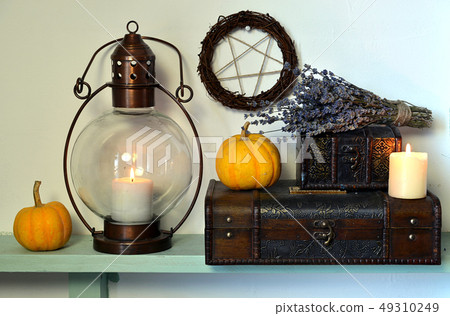 Old-fashioned lamp with lavender and pentagram Old-fashioned lamp with lavender and pentagram 49310249