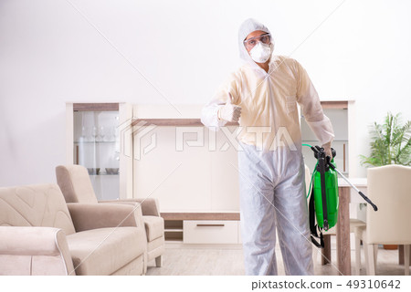 Pest control contractor working in the flat  49310642