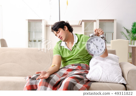 Young man suffering at home Young man suffering at home 49311822