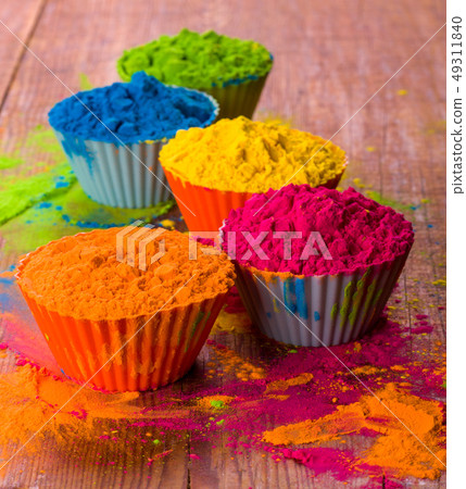 Holi color powder. Organic Gulal colours in bowl for Holi festival, Hindu tradition festive. Blue Holi color powder. Organic Gulal colours in bowl for Holi festival, Hindu tradition festive. Blue 49311840