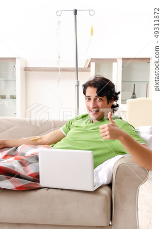 Young man suffering at home Young man suffering at home 49311872
