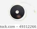 8 mm film reel on white background 49312266