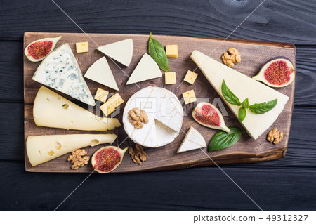Cheeseboard with cheese brie , parmesan , 49312327