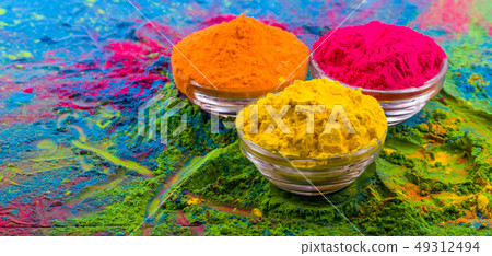 Holi color powder. Organic Gulal colours in bowl for Holi festival, Hindu tradition festive. Bright 49312494