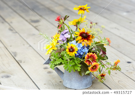 Early summer flower arrangement 49315727