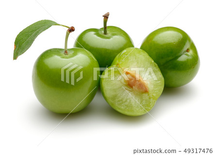 Fresh green plums with leaf isolated on white 49317476