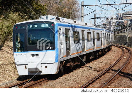 Sagami Railway Series 9000 running fast in Yokohama city in early spring 49321623