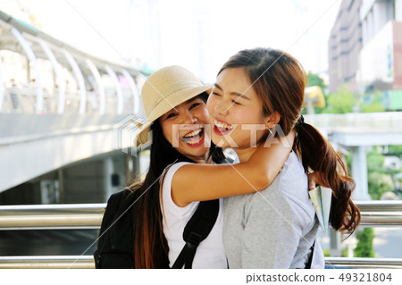 Beautiful woman friends touch hand for meeting. Beautiful woman friends touch hand for meeting. 49321804