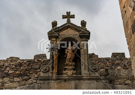 Detail of the Nuestra Senora de la Estrella little temple at the top of the entrance arch to the old Detail of the Nuestra Senora de la Estrella little temple at the top of the entrance arch to the old 49321891