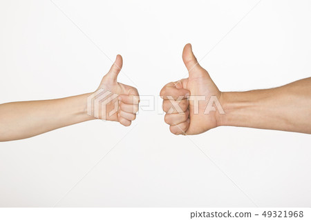 Hands of adult man and child showing thumb up gesture 49321968
