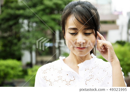 Beautiful woman smile portrait in public park. Beautiful woman smile portrait in public park. 49321995