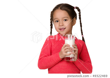 little child girl holding glass of milk on white background little child girl holding glass of milk on white background 49322469