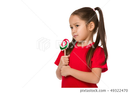 Beautiful cute little girl with a lollipop Beautiful cute little girl with a lollipop 49322470