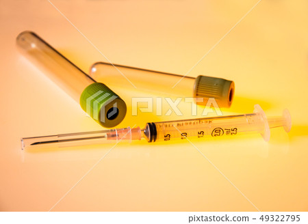 Empty blood test tubes and syringe 49322795