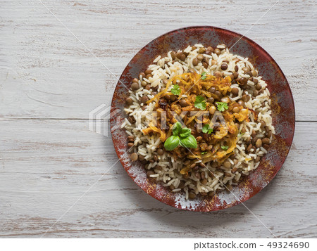 Mujadarra - arabian dish with rice and lentils. Mujadarra - arabian dish with rice and lentils. 49324690