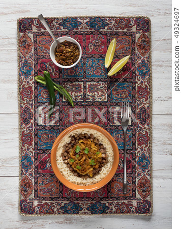 Mujadarra - arabian dish with rice and lentils. Mujadarra - arabian dish with rice and lentils. 49324697