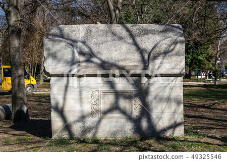 Ancient stone sarcophagus in the public park 49325546