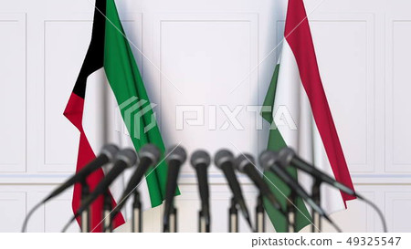 Flags of Kuwait and Hungary at international meeting or negotiations press conference. 3D rendering Flags of Kuwait and Hungary at international meeting or negotiations press conference. 3D rendering 49325547