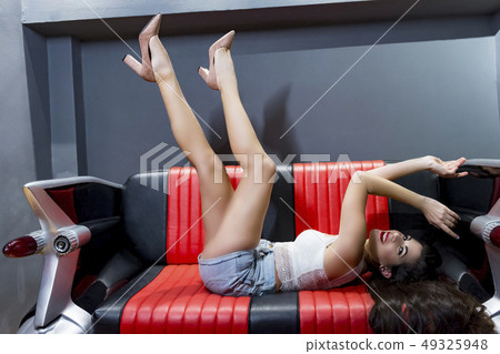 young woman lying on the sofa 49325948