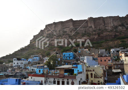 Jodhpur in Rajasthan, India Beautiful cityscape and Mehrangarh Fort Blue dwellings and hotels Jodhpur in Rajasthan, India Beautiful cityscape and Mehrangarh Fort Blue dwellings and hotels 49326502