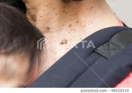 Grandson hugged by grandma 49328514