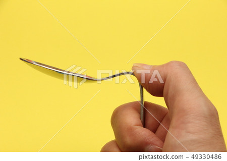 Spoon bending. Magic, psychic image etc. 49330486