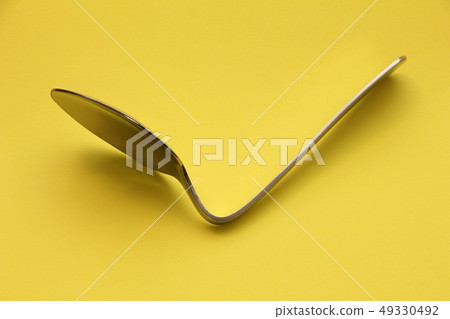 Bent spoon. Magic, psychic image etc. Bent spoon. Magic, psychic image etc. 49330492