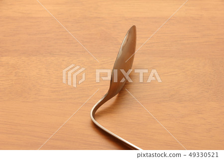 Bent spoon. Magic, psychic image etc. 49330521