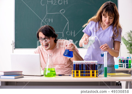 Two chemists students in classroom Two chemists students in classroom 49330858