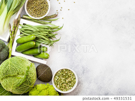 Assorted green toned raw organic vegetables  49331531